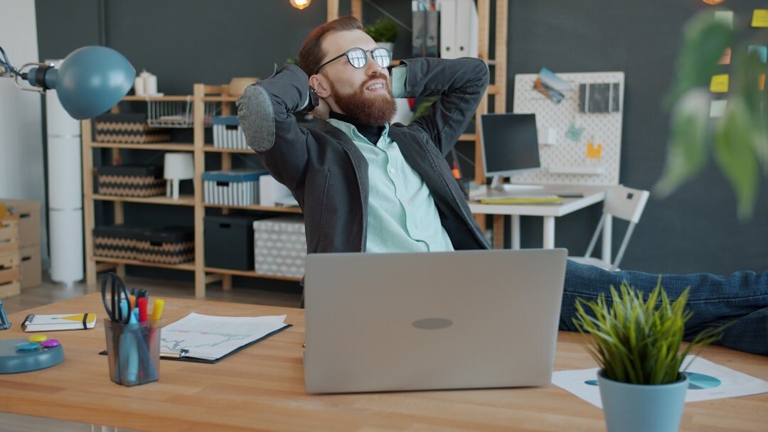 man thinking at desk