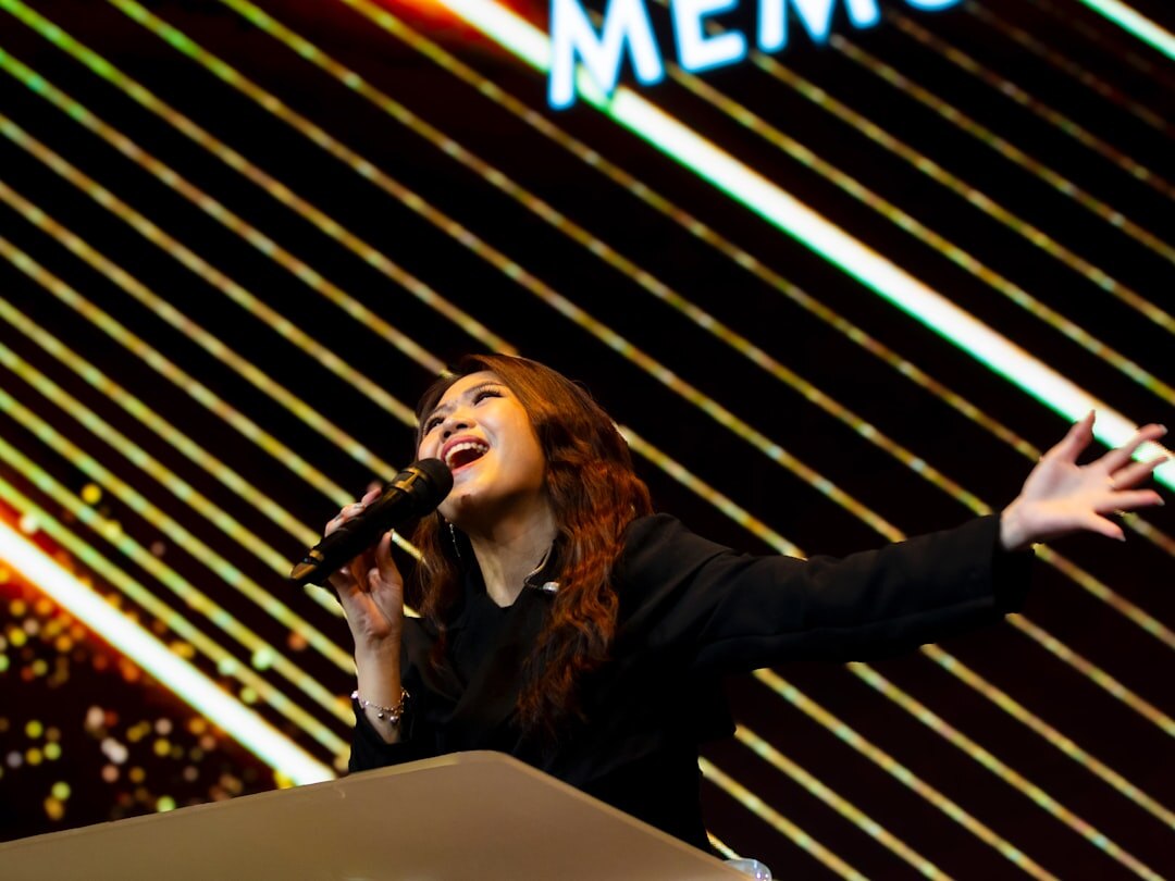 young woman influencer speaking at event