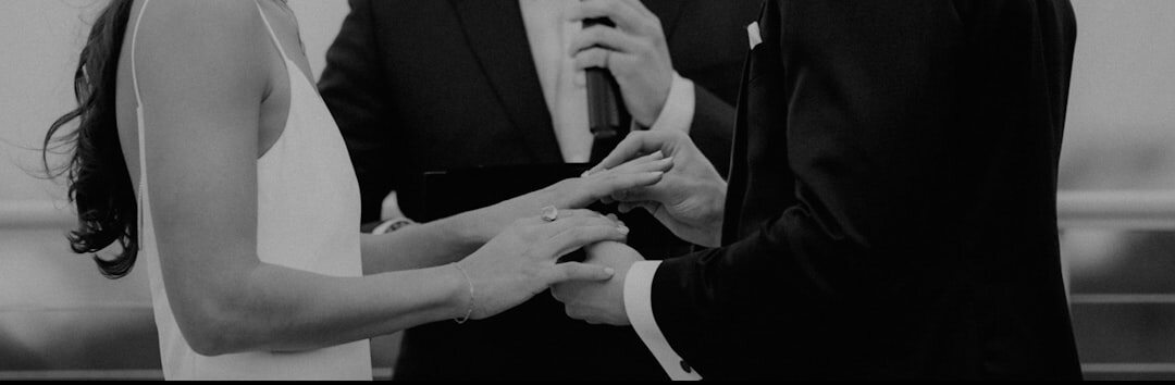 happy couple exchanging rings