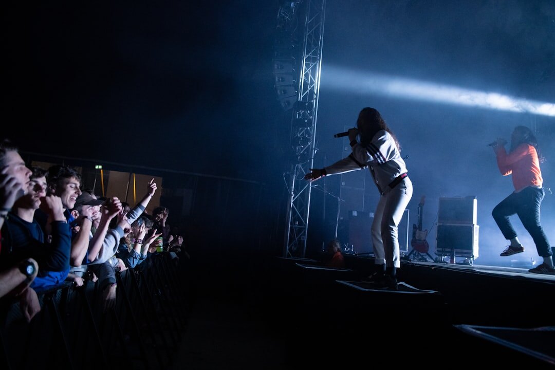 woman singing on stage